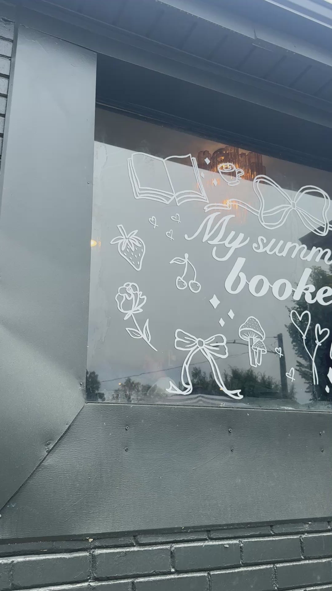 Book store window painting mural booked smut romance reading